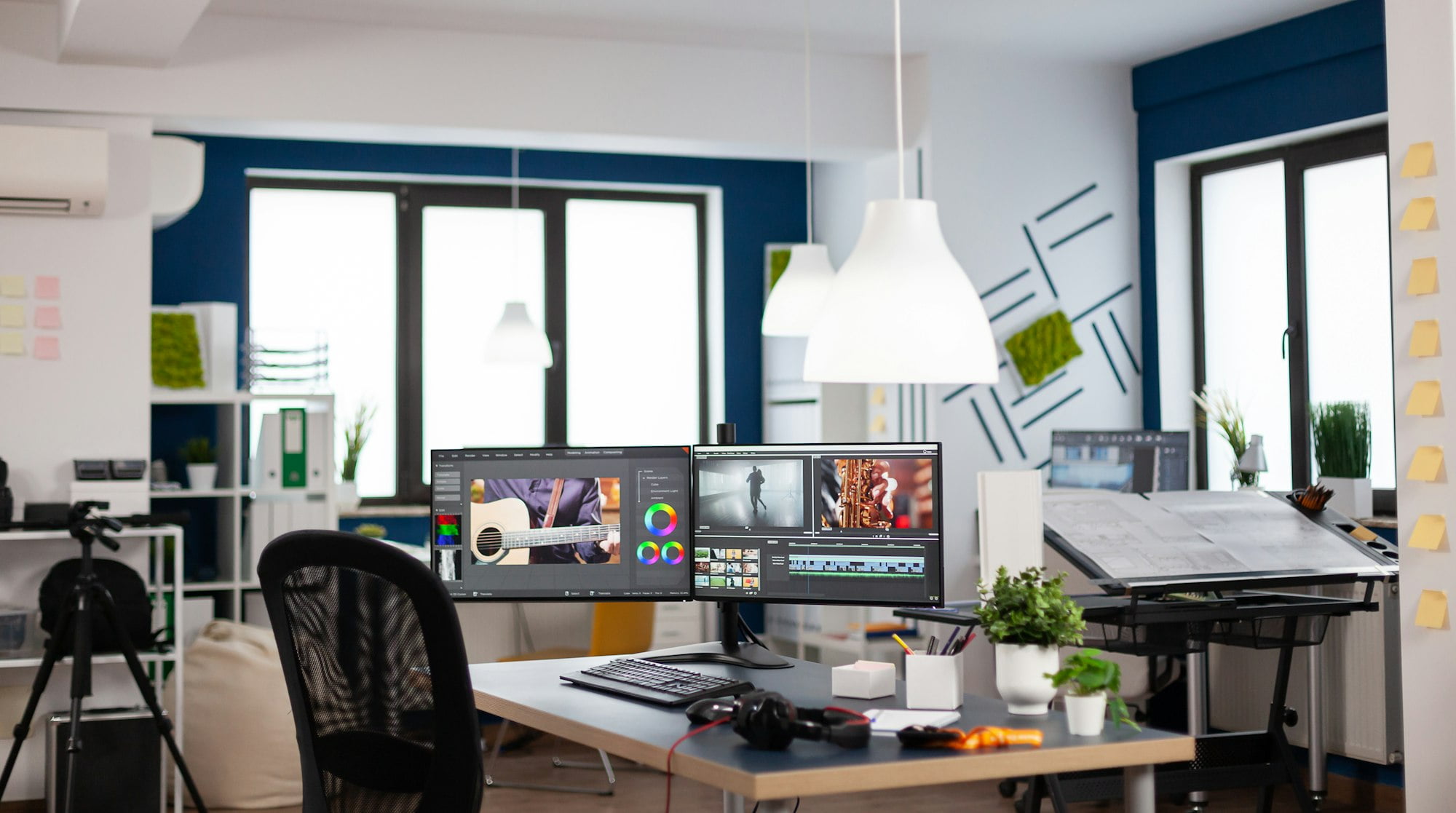 empty modern creative agency office with dual monitors setup